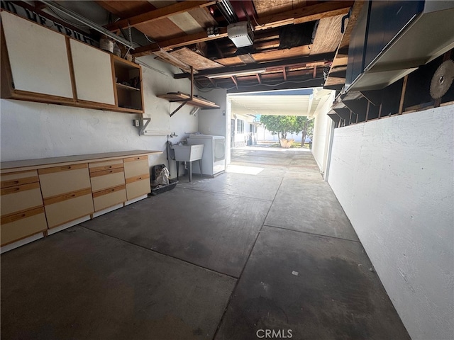 7892 8th St, Buena Park, CA 90621 - garage with washer / dryer and a sink