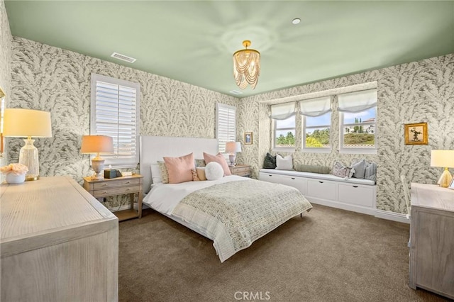 3 Stockmen Rd, Ladera Ranch, CA 92694 - carpeted bedroom featuring wallpapered walls, multiple windows, and a chandelier