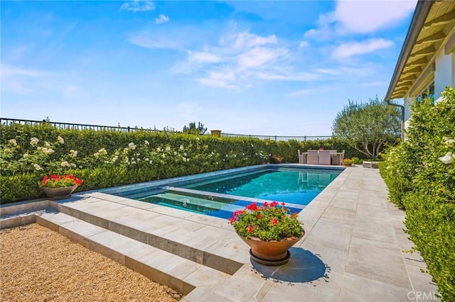 3 Stockmen Rd, Ladera Ranch, CA 92694 - view of swimming pool featuring a fenced backyard, a pool with connected hot tub, agricultural area, and a patio area