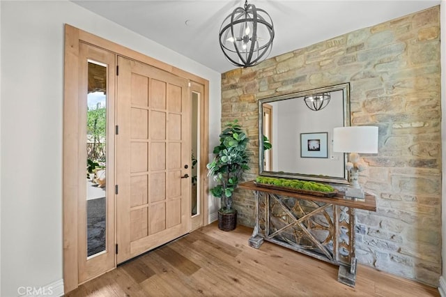 3 Stockmen Rd, Ladera Ranch, CA 92694 - foyer entrance featuring a chandelier and wood finished floors