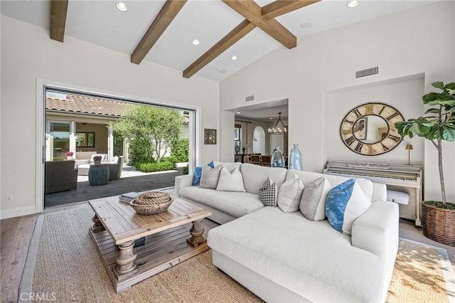 3 Stockmen Rd, Ladera Ranch, CA 92694 - living area featuring beamed ceiling, recessed lighting, wood finished floors, a chandelier, and high vaulted ceiling