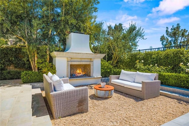 3 Stockmen Rd, Ladera Ranch, CA 92694 - view of patio with an outdoor living space with a fireplace