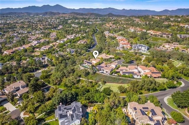 3 Stockmen Rd, Ladera Ranch, CA 92694 - aerial overview of property's location with a mountainous background and nearby suburban area