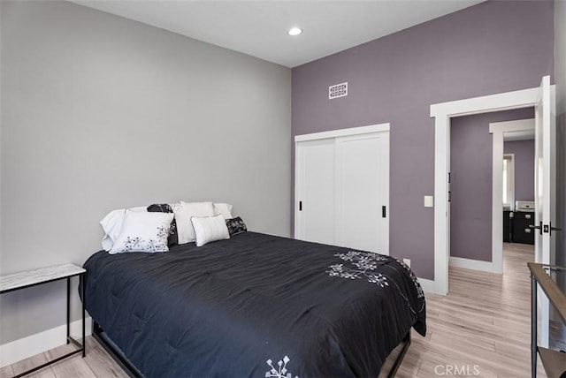 15 Surfbird Ln, Aliso Viejo, CA 92656 - bedroom featuring light wood finished floors, recessed lighting, and a closet