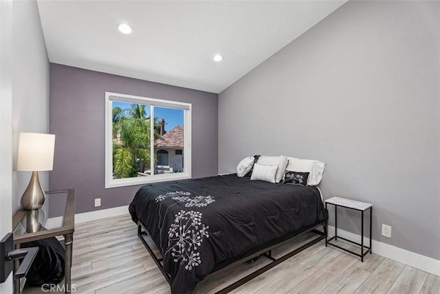 15 Surfbird Ln, Aliso Viejo, CA 92656 - bedroom with wood finished floors, recessed lighting, and vaulted ceiling