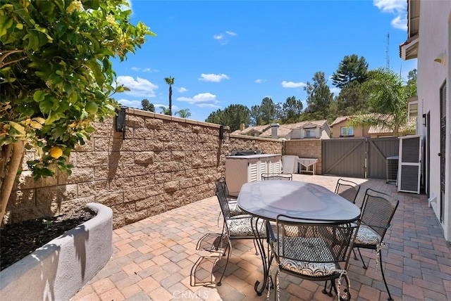 15 Surfbird Ln, Aliso Viejo, CA 92656 - fenced backyard featuring a patio, a gate, and outdoor dining area