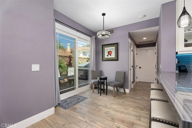 15 Surfbird Ln, Aliso Viejo, CA 92656 - foyer entrance with light wood-type flooring and a chandelier