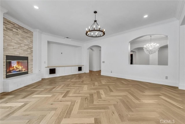12149 Jonathan Dr, Riverside, CA 92503 - unfurnished living room featuring a chandelier, arched walkways, a tile fireplace, recessed lighting, and ornamental molding