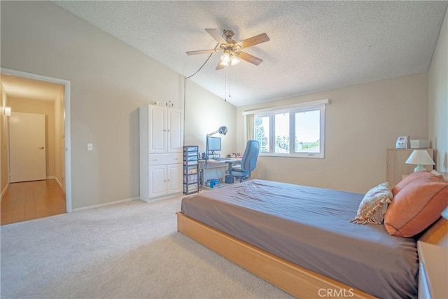 24612 Artemia Ave, Mission Viejo, CA 92691 - bedroom with a textured ceiling, light colored carpet, lofted ceiling, a ceiling fan, and a desk