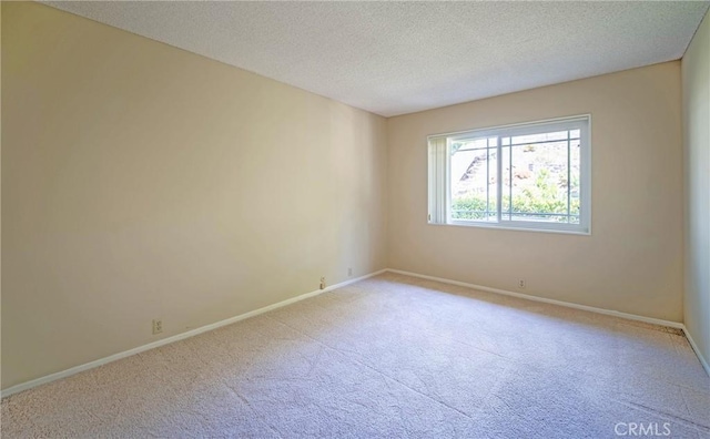 24612 Artemia Ave, Mission Viejo, CA 92691 - unfurnished room with light carpet and a textured ceiling