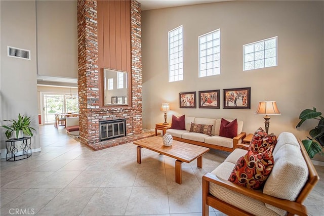 24612 Artemia Ave, Mission Viejo, CA 92691 - tiled living room with a towering ceiling and a fireplace