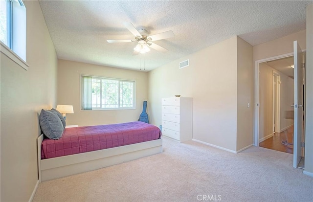 24612 Artemia Ave, Mission Viejo, CA 92691 - bedroom with carpet flooring, a textured ceiling, and ceiling fan