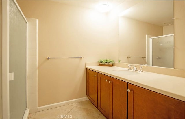 24612 Artemia Ave, Mission Viejo, CA 92691 - full bath featuring vanity, a shower stall, and tile patterned floors