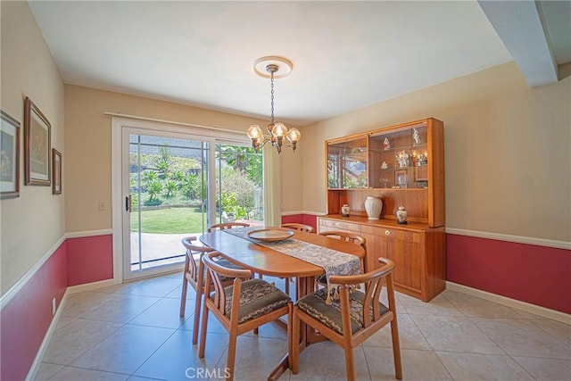 24612 Artemia Ave, Mission Viejo, CA 92691 - dining area with light tile patterned floors and a chandelier