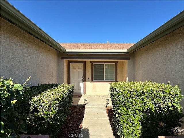53024 Astrid Way, Lake Elsinore, CA 92532 - property entrance with stucco siding
