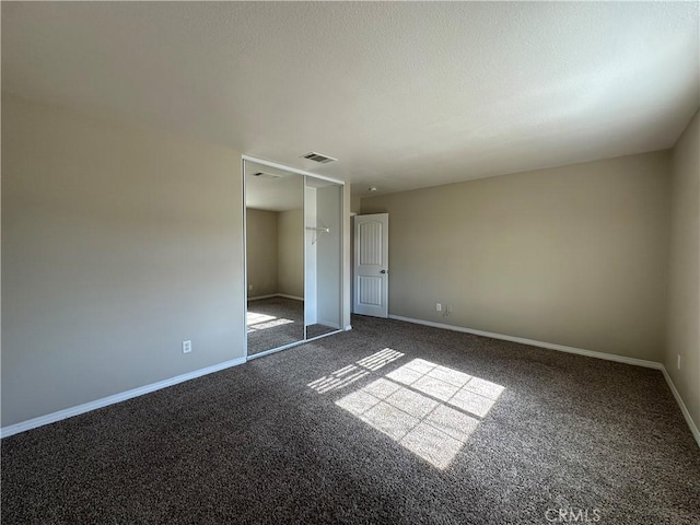 53024 Astrid Way, Lake Elsinore, CA 92532 - unfurnished bedroom with carpet and a closet