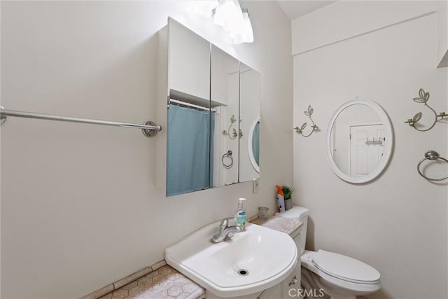 505 W Glendon Way, San Gabriel, CA 91776 - bathroom featuring a sink and a shower with shower curtain