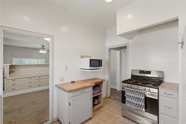 505 W Glendon Way, San Gabriel, CA 91776 - kitchen featuring gas stove, white microwave, white cabinets, and ceiling fan