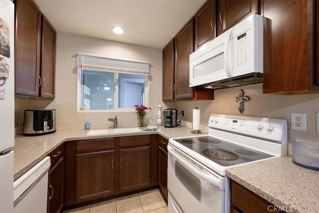 1812 Riverside Ave, Paso Robles, CA 93446 - kitchen with white appliances, light tile patterned floors, and recessed lighting