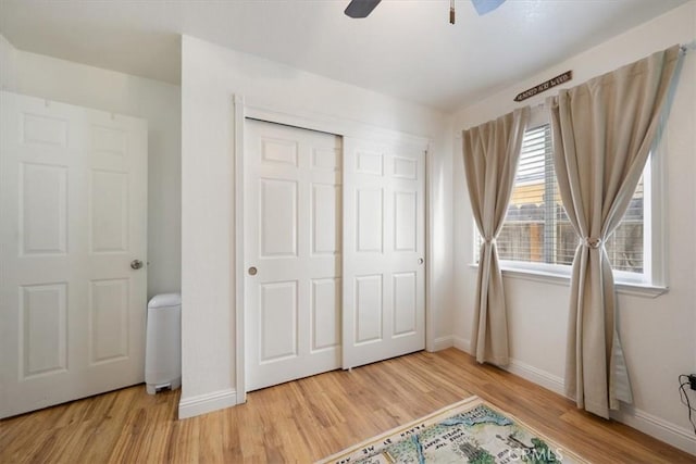 1812 Riverside Ave, Paso Robles, CA 93446 - unfurnished bedroom with light wood-style floors, a closet, and ceiling fan