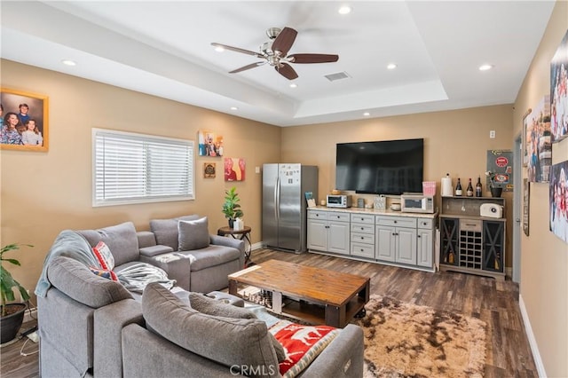 20092 E Frank Ln, Orange, CA 92869 - living area with dark wood-style flooring, a ceiling fan, recessed lighting, and a tray ceiling