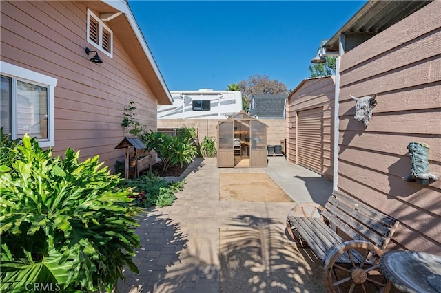 20092 E Frank Ln, Orange, CA 92869 - view of patio featuring an outbuilding and an exterior structure