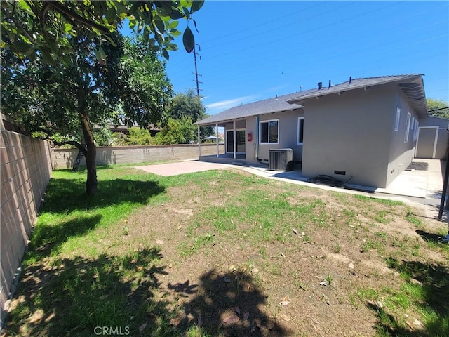 8339 Manzanar Ave, Pico Rivera, CA 90660 - fenced backyard with a patio area