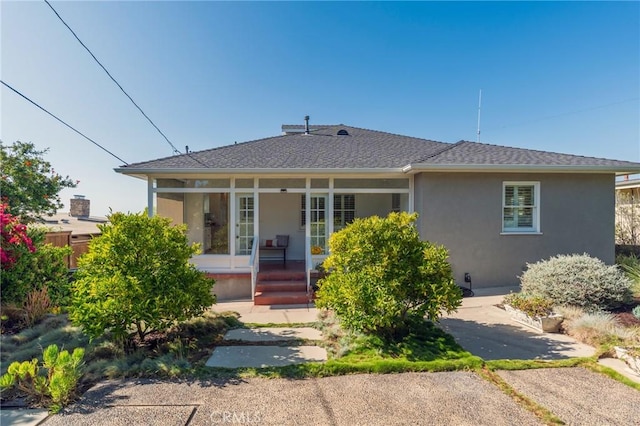 426 Via La Selva, Redondo Beach, CA 90277 - view of front of home featuring stucco siding, a porch, and roof with shingles