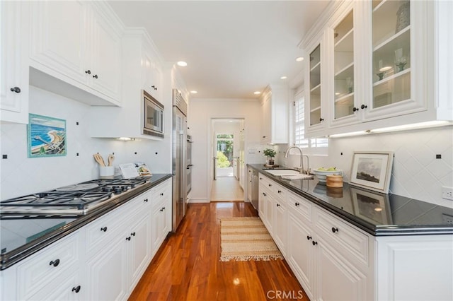 426 Via La Selva, Redondo Beach, CA 90277 - kitchen featuring appliances with stainless steel finishes, dark countertops, white cabinetry, backsplash, and recessed lighting
