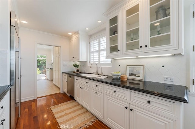 426 Via La Selva, Redondo Beach, CA 90277 - kitchen featuring dark countertops, stainless steel dishwasher, tasteful backsplash, wood finished floors, and ornamental molding