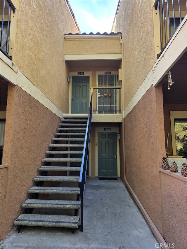 10655 Lemon Ave Unit 1508, Rancho Cucamonga, CA 91737 - doorway to property with stucco siding