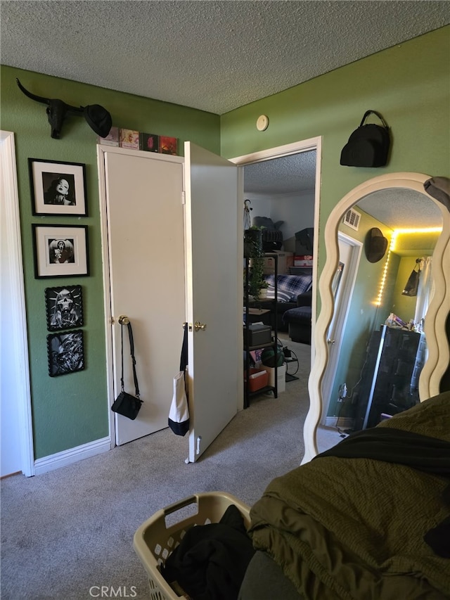 10655 Lemon Ave Unit 1508, Rancho Cucamonga, CA 91737 - bedroom with carpet floors and a textured ceiling
