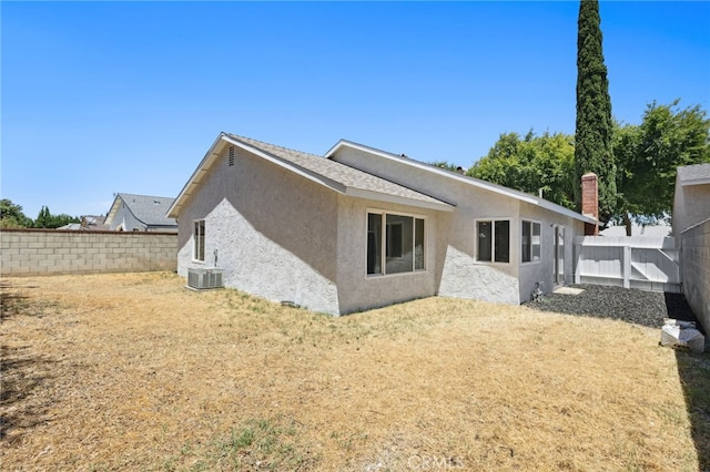 6903 Crest Ave, Riverside, CA 92503 - back of house featuring stucco siding and a fenced backyard