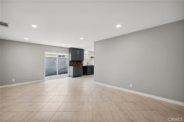 6903 Crest Ave, Riverside, CA 92503 - unfurnished living room featuring recessed lighting