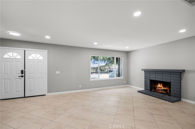 6903 Crest Ave, Riverside, CA 92503 - unfurnished living room with recessed lighting, a brick fireplace, and light tile patterned floors