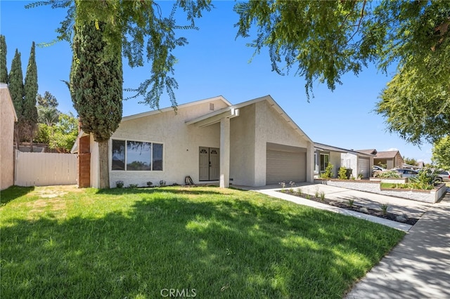 6903 Crest Ave, Riverside, CA 92503 - view of front of home featuring stucco siding, an attached garage, and concrete driveway