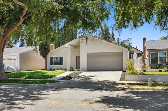 6903 Crest Ave, Riverside, CA 92503 - view of front of house featuring a chimney, a garage, driveway, stucco siding, and a front yard