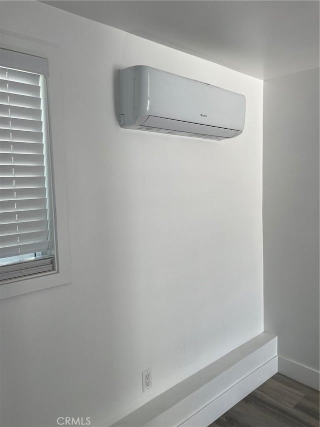3028 E 1st St, Los Angeles, CA 90063 - detailed view of a wall mounted air conditioner and wood finished floors