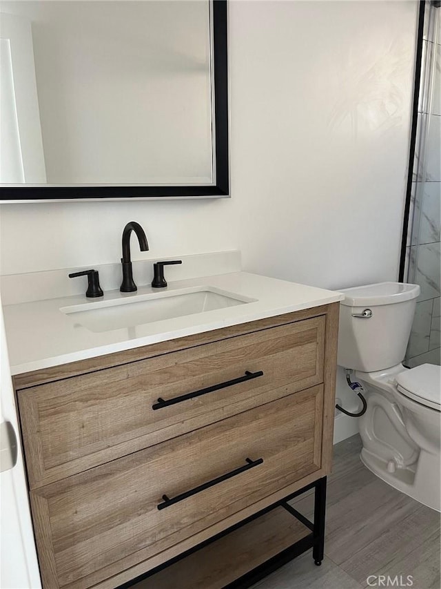 3028 E 1st St, Los Angeles, CA 90063 - bathroom featuring vanity and wood finished floors
