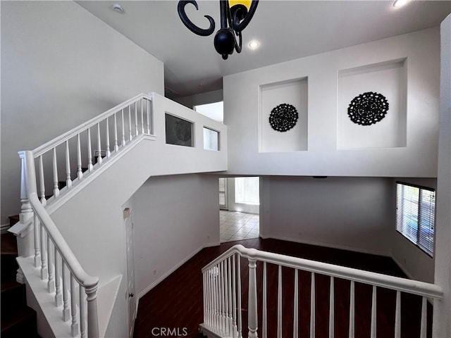 16340 Willowmist Ct, Chino Hills, CA 91709 - staircase with recessed lighting, wood finished floors, and a chandelier