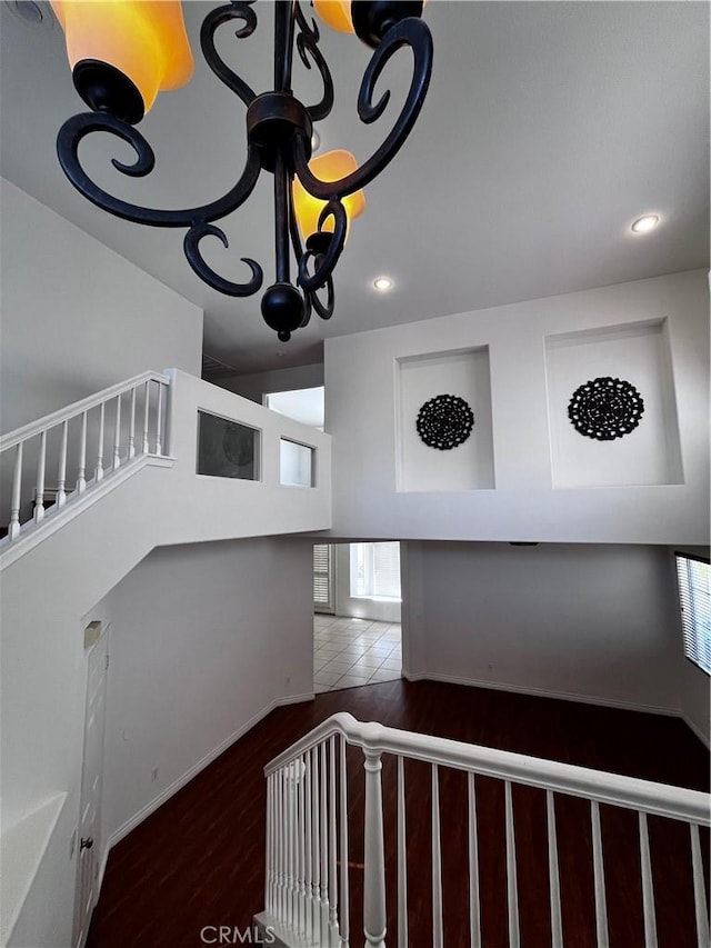 16340 Willowmist Ct, Chino Hills, CA 91709 - stairs with a chandelier, wood finished floors, and recessed lighting