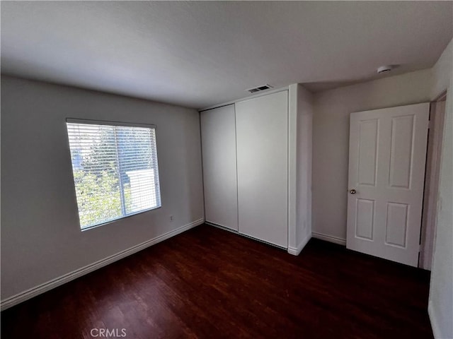 16340 Willowmist Ct, Chino Hills, CA 91709 - unfurnished bedroom featuring dark wood-style flooring and a closet