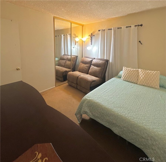 9620 San Vincente Ave, South Gate, CA 90280 - carpeted bedroom with a textured ceiling and a closet