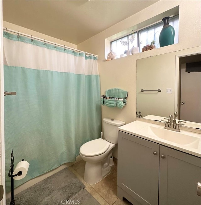9620 San Vincente Ave, South Gate, CA 90280 - full bathroom with vanity, tile patterned floors, and curtained shower