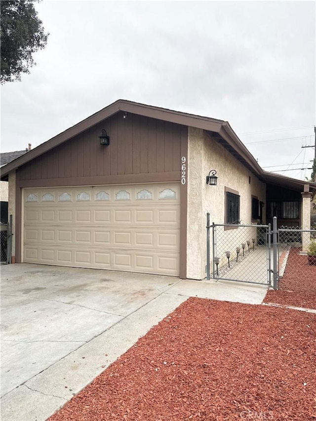 9620 San Vincente Ave, South Gate, CA 90280 - garage with a gate and concrete driveway