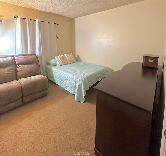 9620 San Vincente Ave, South Gate, CA 90280 - bedroom with a textured ceiling and carpet floors