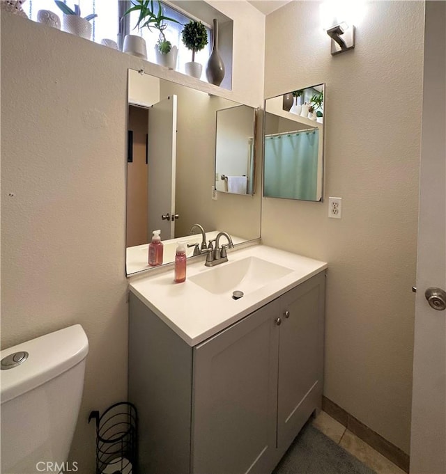 9620 San Vincente Ave, South Gate, CA 90280 - full bathroom with vanity and tile patterned flooring