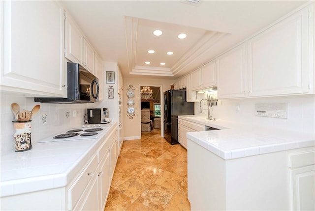 662 Via Zapata, Riverside, CA 92507 - kitchen featuring black appliances, recessed lighting, a raised ceiling, tasteful backsplash, and white cabinets