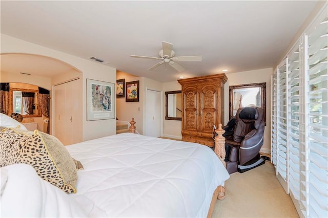 662 Via Zapata, Riverside, CA 92507 - carpeted bedroom with arched walkways, ceiling fan, and recessed lighting
