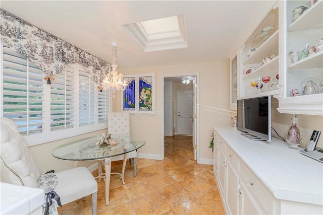 662 Via Zapata, Riverside, CA 92507 - dining space featuring a chandelier and a skylight